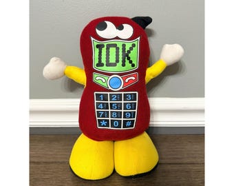 Peluche vintage de teléfono móvil Coinstar IDK