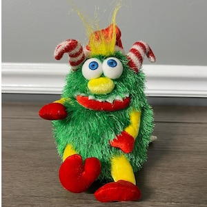 Peluche mostro natalizio verde animato Gemmy vintage