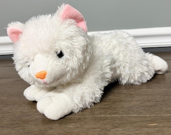 Peluche de gato calico suave y tierno