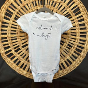 Midnights themed baby onesie