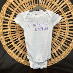 Enchanted to meet you baby onesie