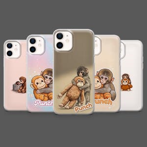 May include: A collection of phone cases featuring illustrations of monkeys. The designs include monkeys hugging each other, with the word "Punch" on some cases. The cases are in various colors, including pink, beige, and clear.