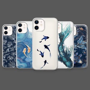 May include: A collection of phone cases featuring aquatic designs. The cases display various artistic renderings of koi fish and water patterns in shades of blue, white, and gold. The designs range from detailed illustrations to abstract watercolor effects.