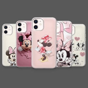 May include: A collection of five phone cases featuring Minnie Mouse designs. The cases showcase various illustrations of Minnie Mouse in different poses, with pink and white color schemes. Some cases have 3D elements.