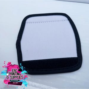 May include: A white rectangular item with a black border and a black bottom section. The item has a soft, fabric-like texture. The image also includes a logo with the text "ERC PRINTING & SUPPLIES".