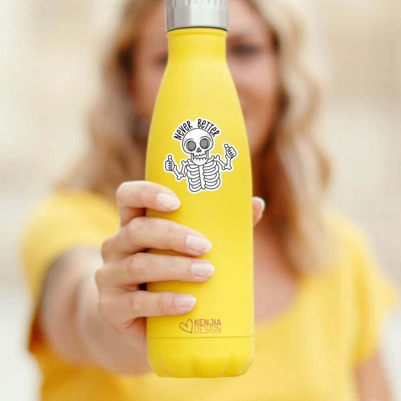 May include: Yellow stainless steel water bottle with a white sticker featuring a cartoon skeleton with thumbs up and the text "Never Better".