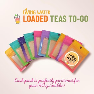 May include: Assortment of colorful, individually packaged "Loaded Teas To-Go" in various colors, including yellow, pink, purple, and teal. Each pack is labeled with "Living Water" branding and is perfectly portioned for a 40oz tumbler.