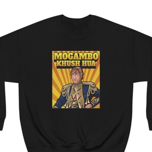 May include: Black sweatshirt with a yellow and orange graphic of a man in a costume with the text "Mogambo Khush Hua".