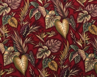 May include: Red fabric with a tropical leaf pattern. The leaves are in shades of green, brown, and gold. The background is a deep red.
