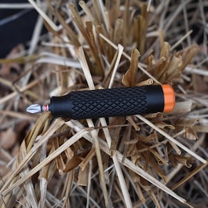 Small EDC bit driver with handle bit storage, and Knurled grip, screwdriver.
