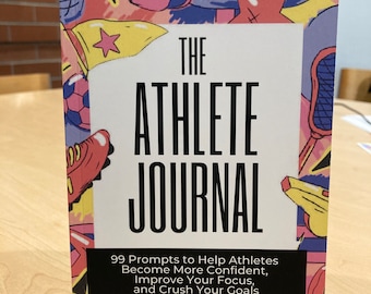 May include: A colorful journal with the title "THE ATHLETE JOURNAL" and the text "99 Prompts to Help Athletes Become More Confident, Improve Your Focus, and Crush Your Goals".