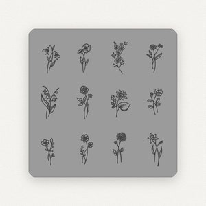 May include: A gray square with rounded corners displays twelve delicate line drawings of various flowers. Each flower is depicted in a simple, elegant style, showcasing different floral varieties. The drawings are in black against the gray background.