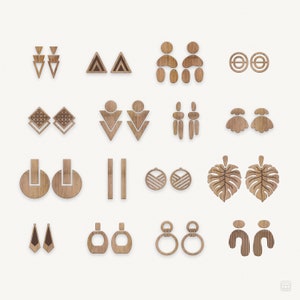 May include: Set of 16 wooden earring designs, featuring geometric shapes, circles, and leaf patterns. The earrings are made of natural wood and have a rustic, bohemian style.