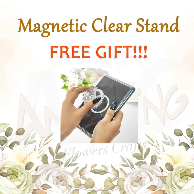 Puede incluir: Un soporte magn&eacute;tico transparente para tel&eacute;fono se sostiene sobre un tel&eacute;fono en una funda transparente. El texto "Magnetic Clear Stand" es dorado y "FREE GIFT!!!" es rojo. El fondo tiene un dise&ntilde;o floral.