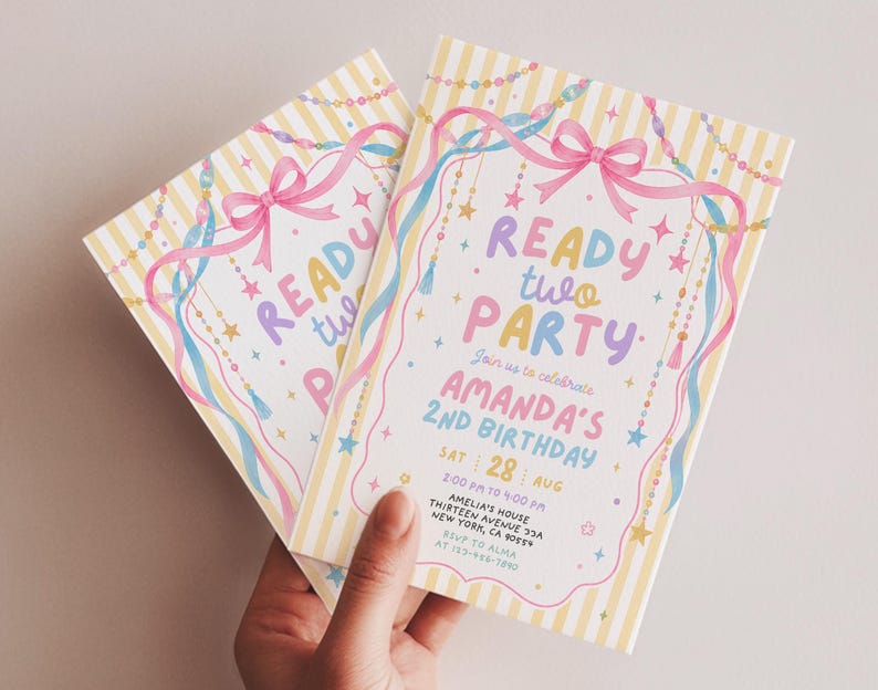May include: Two rectangular birthday party invitations with yellow and white vertical stripes. The text reads READY TWO PARTY, AMANDA'S 2nd BIRTHDAY, SAT 28 AUG, 2:00 PM TO 4:00 PM, AMELIA'S HOUSE, THIRTEEN AVENUE 73A, NEW YORK, CA 90554, RSVP TO ALMA AT 123-456-7890.