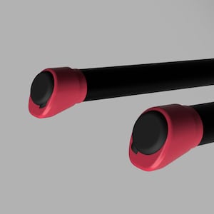 May include: Two black exercise bars with red end caps. The bars are made of metal and have a smooth finish.