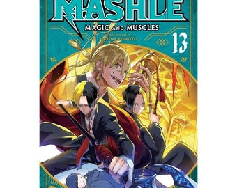Op de afbeelding: Deel 13 van de manga-serie "MASHLE: MAGIC AND MUSCLES" door Hajime Komoto. De cover toont een kleurrijke illustratie van personages uit de serie, waaronder een personage met geel haar en een brede glimlach, en een ander personage met zwart haar en een serieuze uitdrukking. De cover toont ook de titel van de serie en het deelnummer.