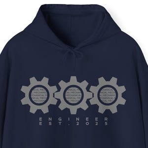 May include: Navy blue hooded sweatshirt with three gray gears and the text "ENGINEER EST. 2025".