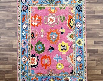 Hand-Knotted Wool Area Rug: Pink Boho Turkish Style