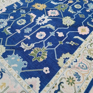 Hand Knotted Wool Oushak Rug: Blue Floral Turkish Carpet