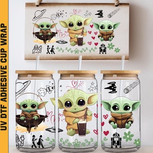 a couple of mason jars with baby yoda on them