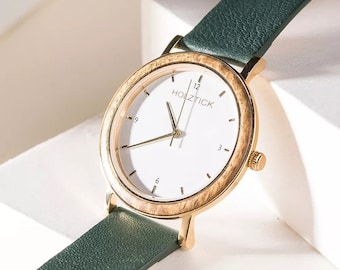 Montre-bracelet pour femme avec un anneau en bois encadré et un bracelet en cuir véritable