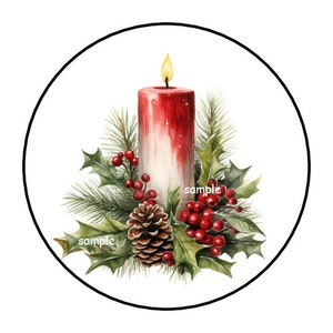 May include: A red and white candle with a yellow flame is surrounded by green holly leaves and red berries. A brown pine cone is also included in the arrangement. The image is set against a white background.
