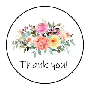 May include: Round sticker with a watercolor floral bouquet in shades of pink, yellow, and peach. The bouquet is surrounded by green leaves and the text "Thank you!" is printed below the flowers.