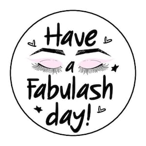 May include: A white circle with a black outline features a black and white illustration of closed eyes with eyelashes and the text "Have a Fabulash day!" with hearts and stars.