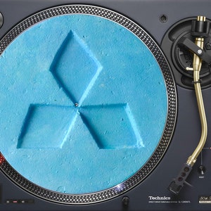 Rave blue Mitsubishi pill slipmat for vinyl record deck turntable