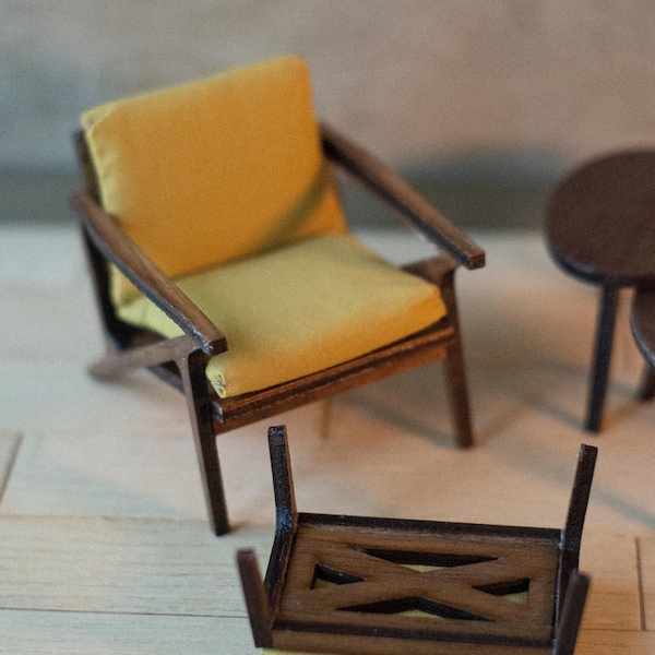 Armchair and footstool in vintage retro style in 1/12 scale. Dollhouse furniture, miniature diorama.