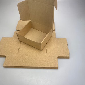 9 cajas de cartón corrugado kraft para envíos, cajas postales para paquetes pequeños, para negocios, almacenamiento o regalos (16,5 x 14,5 x 6,5 cm, marrón/marrón)