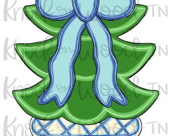 May include: A green Christmas tree design with a light blue bow on top. The tree sits in a blue and white decorative pot. A festive holiday decoration.
