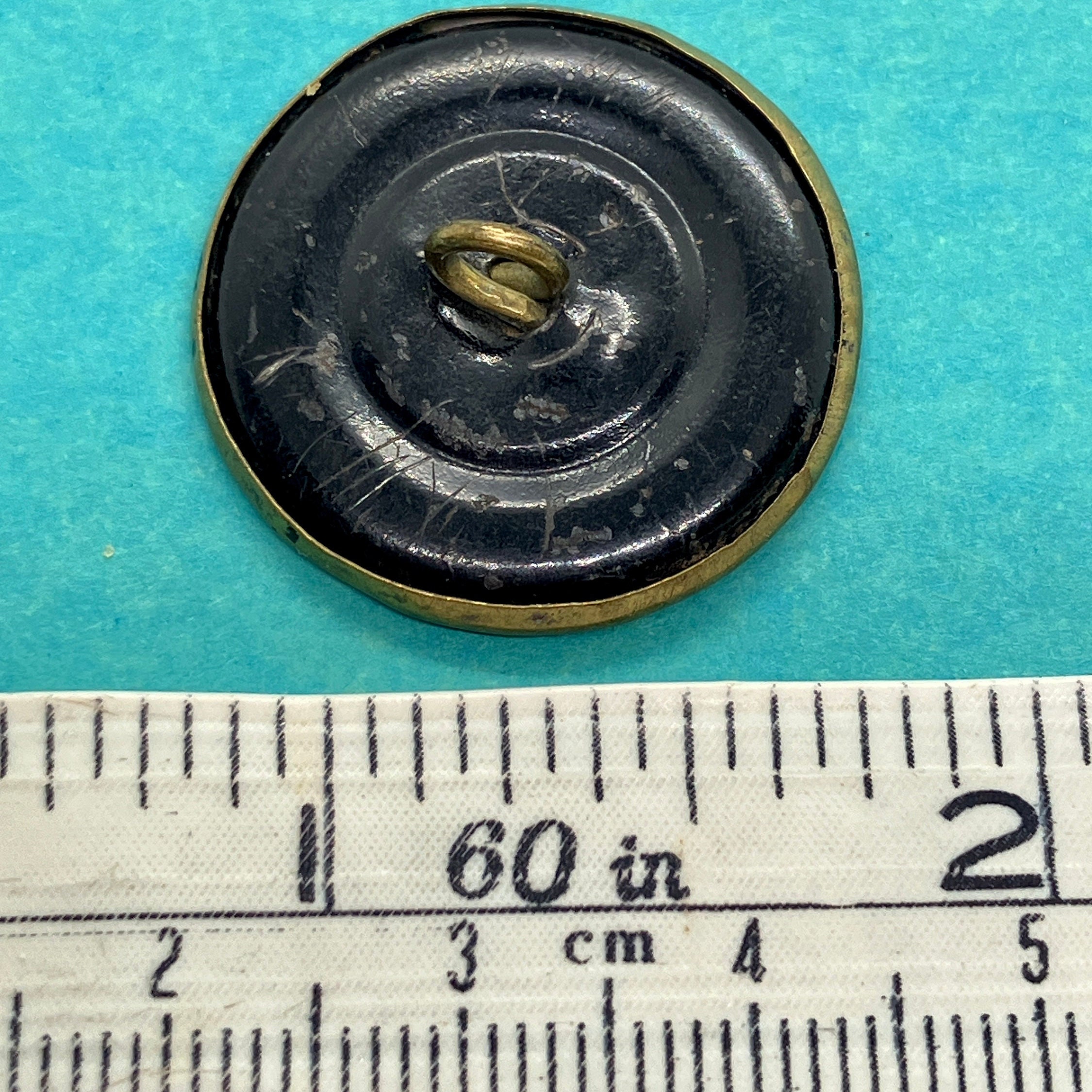 Antique Pictorial Brass Button Depicting Child and Bird Whistling