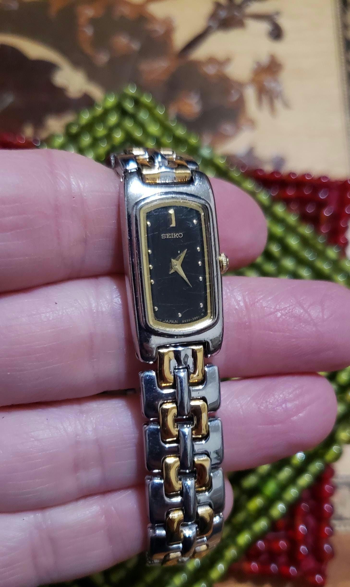 Vintage Seiko Ladies Tank Watch: Gold & Silver Tone, Black  display picture 3
