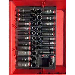 May include: A red toolbox containing a set of black sockets with red markings. The sockets are arranged in rows and columns, with sizes ranging from 5/16 to 3/4 inches. The toolbox is open, revealing the organized tool set.