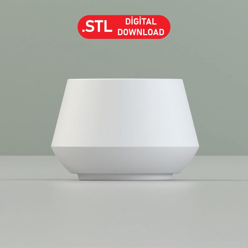 May include: White ceramic planter with a wide, rounded base and a slightly flared top.  The planter is designed for indoor plants and has a modern, minimalist style.