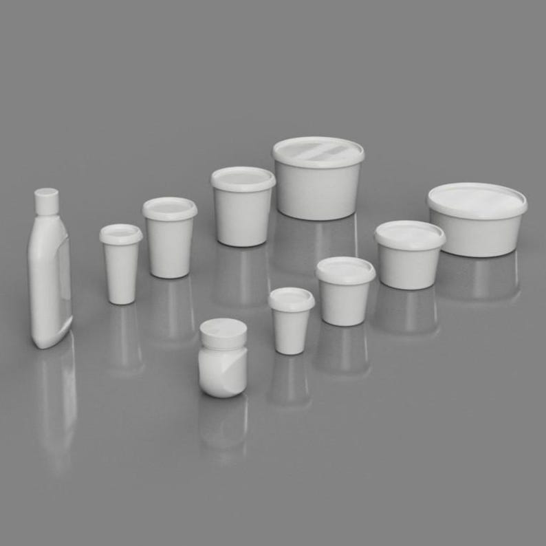 May include: A collection of white plastic containers of various sizes, including a tall bottle, a round container, and several cups. The containers are arranged on a grey surface.