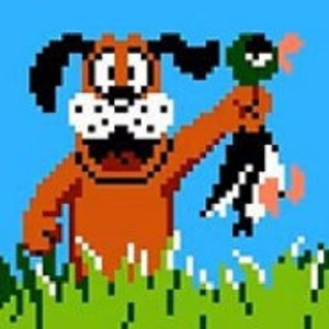 Latch Hook Kit (DIY) 80's Videogame Hunting Dog holding Duck (12 inches x 12 inches)