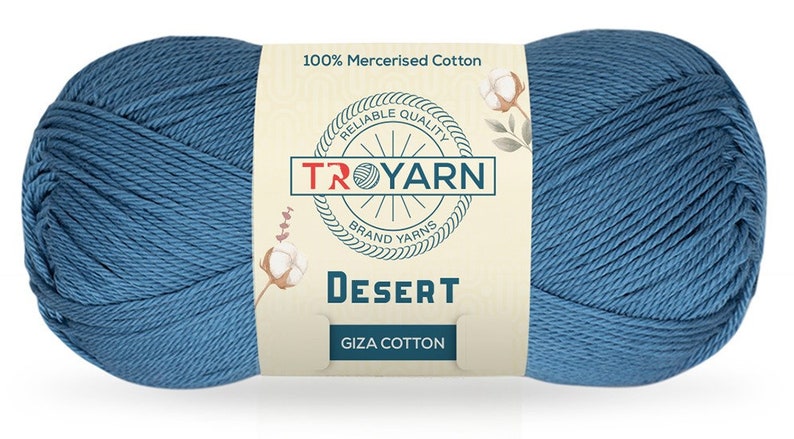 May include: A skein of blue 100% mercerized cotton yarn labeled "TROYARN" with the words "Reliable Quality" and "Brand Yarns" on the label. The yarn is labeled "Desert Giza Cotton".