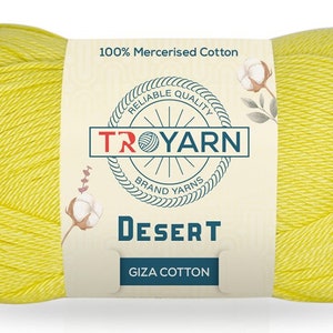 May include: A skein of yellow 100% mercerized cotton yarn labeled "TROYARN Brand Yarns" and "DESERT GIZA COTTON".