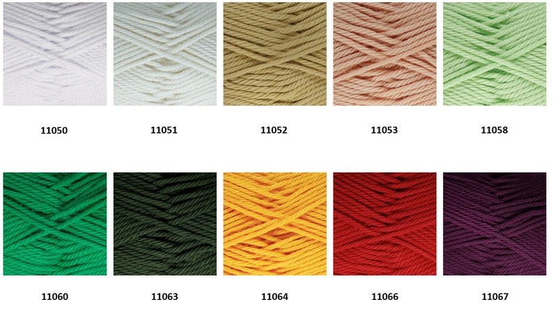 May include: A collection of yarn skeins in various colors, including white, beige, pink, green, yellow, red, and purple. Each skein is labeled with a number, such as 11050, 11051, 11052, 11053, 11058, 11060, 11063, 11064, 11066, and 11067.