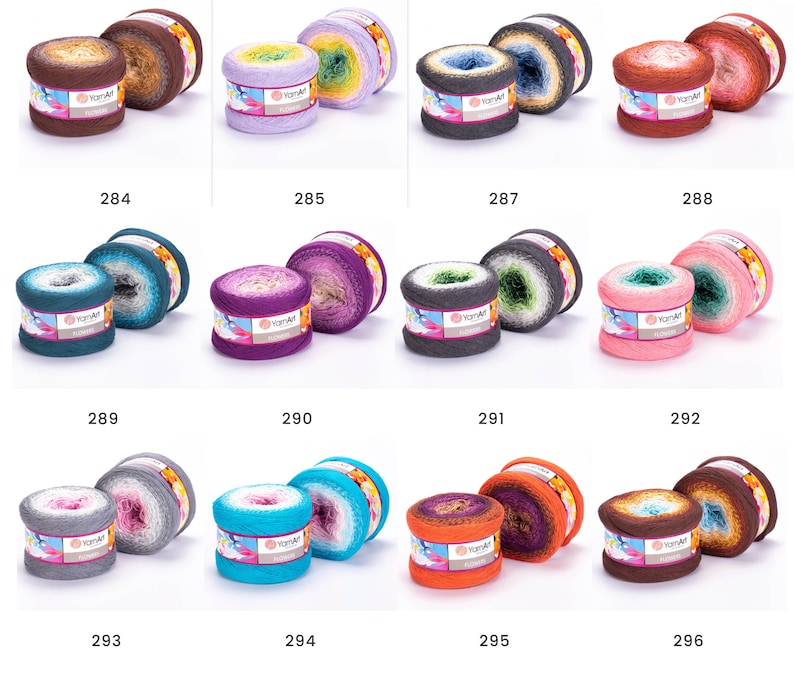 May include: Twelve skeins of ombre yarn in various colors, including brown, purple, teal, pink, gray, blue, orange, and white. Each skein is labeled "YarnArt"