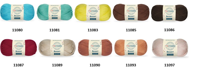 May include: Ten skeins of yarn in various colors, including turquoise, yellow, brown, red, beige, and peach. Each skein has a label that reads "Taiyarn Desert". The skeins are arranged in two rows of five, with the numbers 11080 through 11097 printed below each skein.