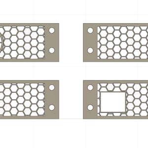 Puede incluir: Cuatro paneles metálicos beige con un patrón de malla hexagonal. Cada panel tiene un recorte rectangular y un recorte circular con el texto "S1" en su interior.