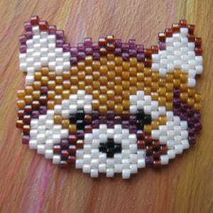 Broche panda roux
