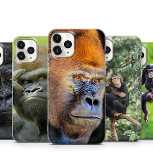 May include: Five smartphone cases showcasing primate portraits. The cases feature detailed images of gorillas and chimpanzees, with a focus on their facial expressions. The cases have a glossy finish and are designed to fit a smartphone.