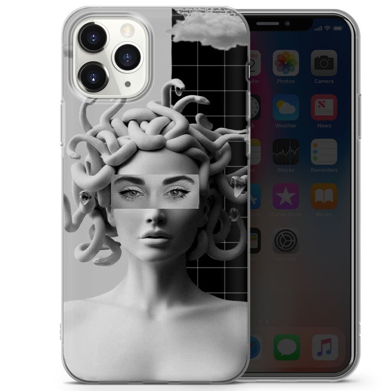 May include: A clear phone case featuring a black and white image of a woman with snakes for hair. The woman's eyes are covered by a white rectangle with the word "Medusa" printed on it.