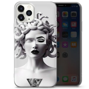 May include: A clear phone case featuring a black and white image of Medusa, a mythical Greek figure with snakes for hair. The image is styled with a modern, graphic design aesthetic.
