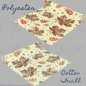 May include: Two rolls of fabric featuring a cream background with a repeating pattern of autumn leaves in shades of orange, red, green, and brown. The text Polyester is near the top roll, and Cotton Twill is near the bottom roll of fabric.
